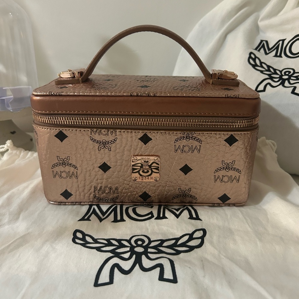 Authentic MCM Metallic Rose Gold with Top Handle and crossbody strap